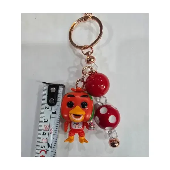Handmade Beaded Keychain With Reworked Mini Figure - Picture 6 of 10